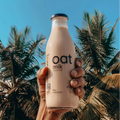 Unsweetened Oat Milk in Glass Bottles