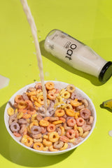 Pocket-sized 200ml glass bottle of OatMlk, the perfect pre-measured portion for frothing a single barista-style latte.